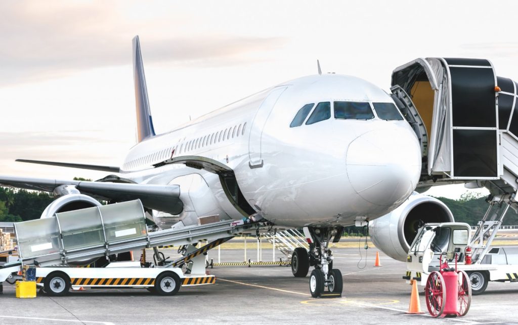 side-view-of-airplane-at-airport-terminal-gate-2024-07-03-02-44-15-utc.jpg